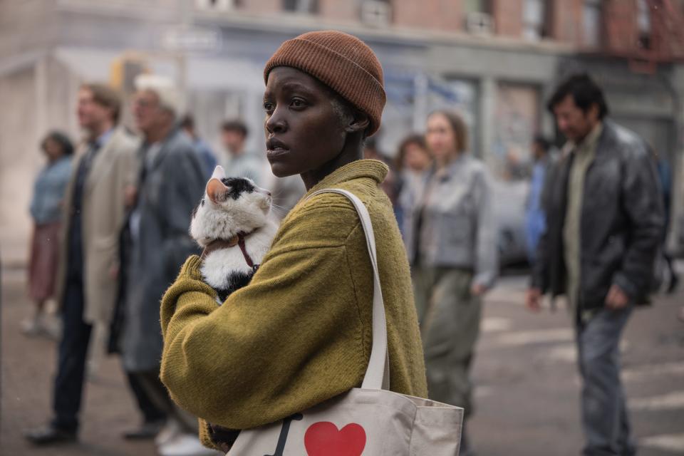 Samira (Lupita Nyong’o) and her feline buddy try to survive New York City under alien attack in "A Quiet Place: Day One."
