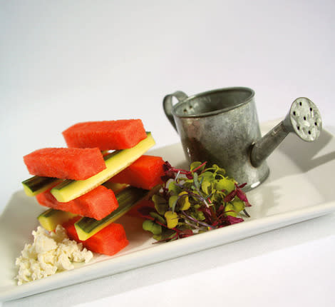 For a luscious summer salad, pair watermelon and cucumber with feta cheese and fresh baby greens.