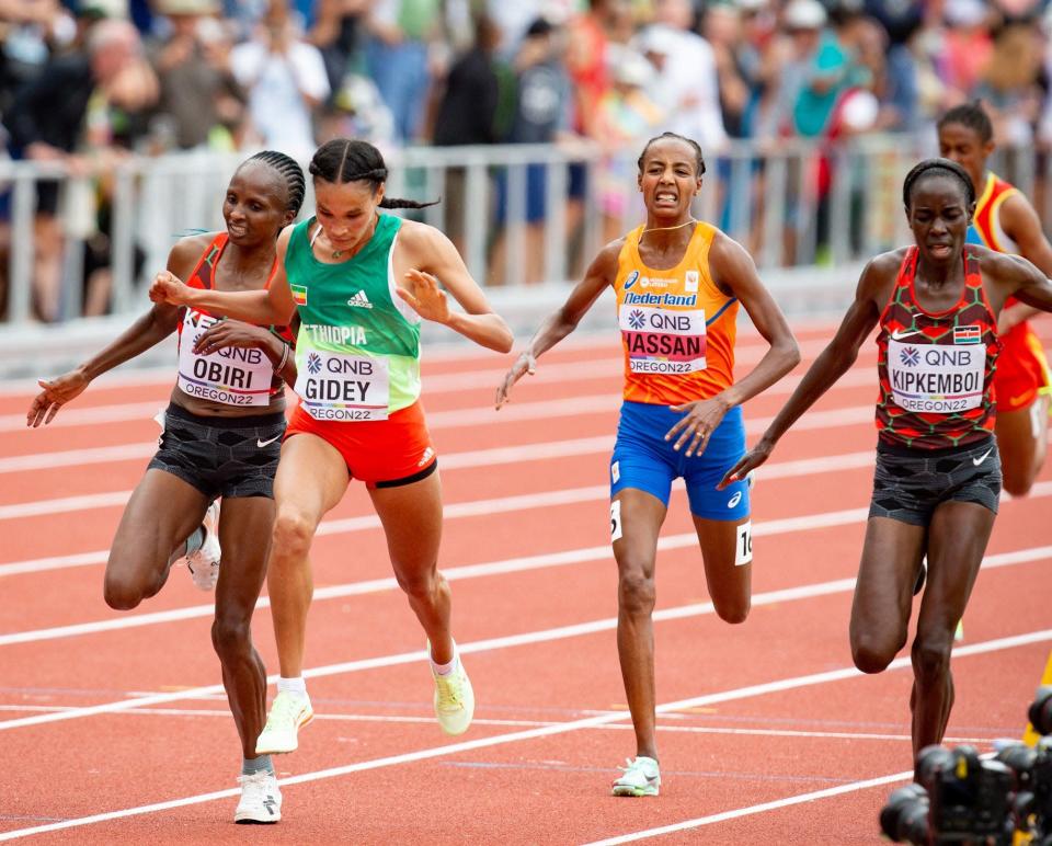 Ethiopia's Letesenbet Gidi, center, took a close women's victory 10,000 meters ahead of Helen Obiri, left, second, Sifan Hasan, fourth, and Margaret Chelimo Kipkemboi, third.  right, during the second day of the World Athletics Championships on July 16, 2022 at Hayward Field in Eugene, Oregon.