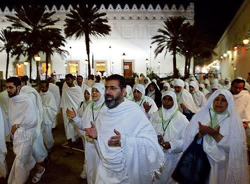 Imam Qazwini leads his pilgrim group out of the Al Shajara mosque outside Medina. The group has just performed a mass declaration of intent to perform the Hajj -- the final step before traveling to Mecca.