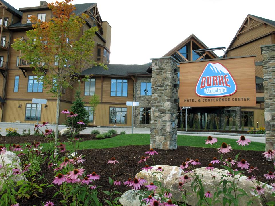 In this Sept. 1, 2016, file photo, the Lodge at Burke Mountain is pictured on the day it officially opened in East Burke, Vt. The new hotel and conference center at the Vermont ski resort is one of several new amenities and offerings around the Northeast this ski season, including more snowmaking and more options for off-slope activities.
