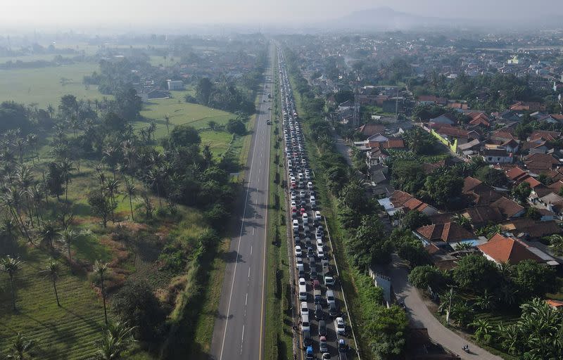 Indonesian Muslims leave the capital city to return to their hometowns for Eid celebrations