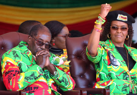 FILE PHOTO: Zimbabwean President Robert Mugabe and his wife Grace attend a rally in Marondera, Zimbabwe, June 2, 2017. REUTERS/Philimon Bulawayo/File Photo