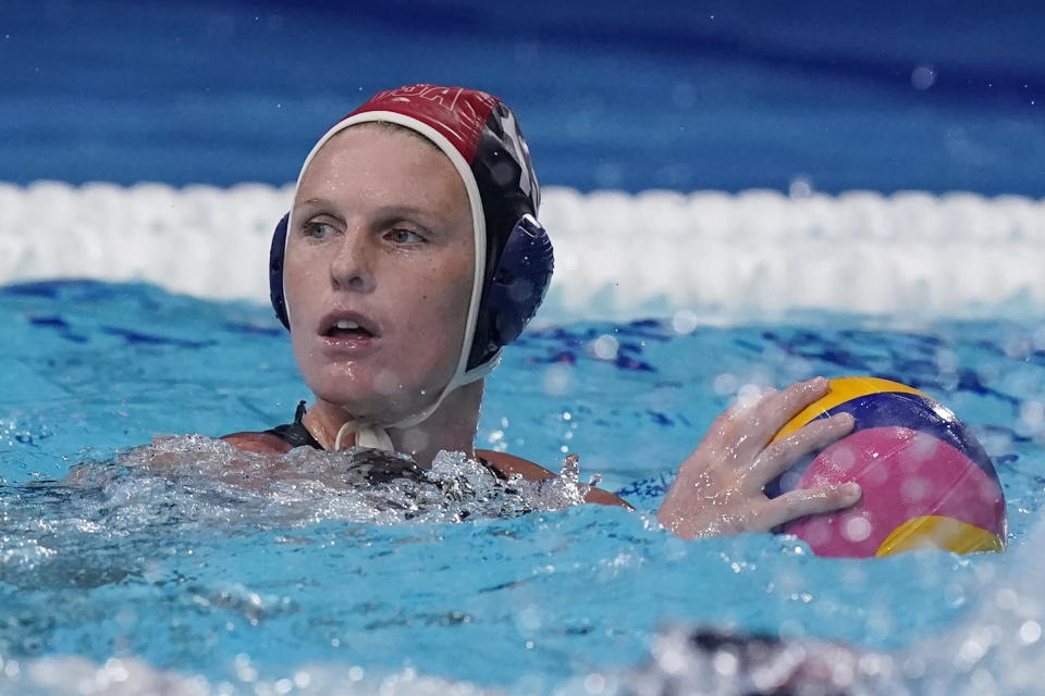 United States' goalkeeper Amanda Longan plays against Canada in the fourth quarter of a quarterfinal round women's water polo match at the 2020 Summer Olympics, Tuesday, Aug. 3, 2021, in Tokyo, Japan. It is her first game at the Olympics. (AP Photo/Mark Humphrey)