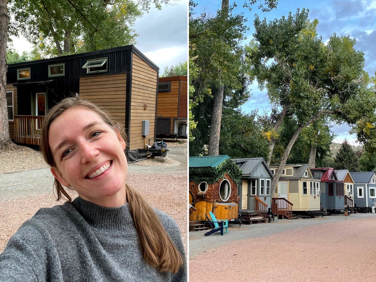 The author in front of a tiny house.