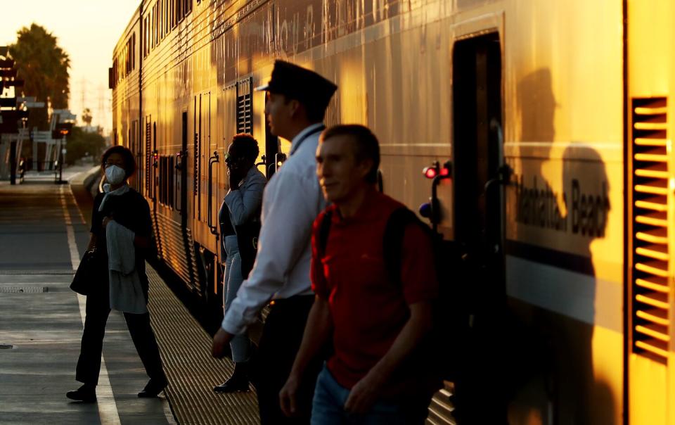 Passengers disembark from the Amtrak Pacific Surfliner in Anaheim.