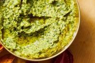 <p>This creamy, herb-filled dip takes just 15 minutes to make. You can add a Halloween twist by calling it a goblin dip or a Frankenstein dip. </p><p>Get the <strong><a href="https://www.goodhousekeeping.com/food-recipes/a38473895/white-bean-dip-recipe/" rel="nofollow noopener" target="_blank" data-ylk="slk:Herbed White Bean Dip recipe;elm:context_link;itc:0;sec:content-canvas" class="link ">Herbed White Bean Dip recipe</a></strong>. </p>