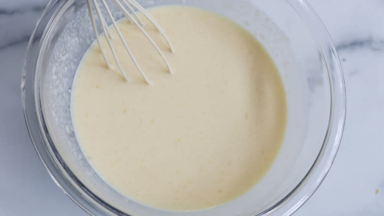 milky liquid in mixing bowl