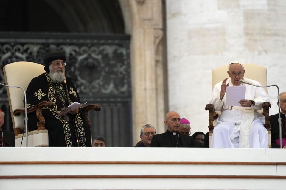 The Patriarch Tawadros II of Alexandria, left, listens to Pope Francis' speech during the weekly general audience in St. Peter's Square at The Vatican, Wednesday, May 10, 2023. Pope Francis and the Orthodox Coptic pope have delivered a joint blessing from St. Peter's Square, a significant ecumenical gesture to commemorate the 50th anniversary of a historic meeting of their predecessors. (AP Photo/Alessandra Tarantino)