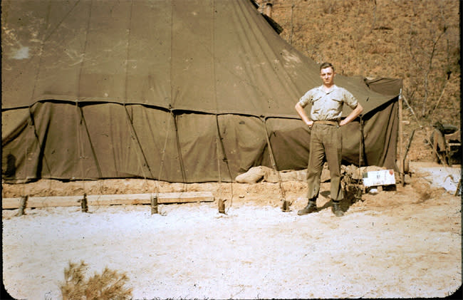 <span>Ron Carruth in front of his tent in A Echelon, circa 1952. Photo courtesy of <a href="http://www.thememoryproject.com/stories/Korea/" rel="nofollow noopener" target="_blank" data-ylk="slk:Ron Carruth;elm:context_link;itc:0;sec:content-canvas" class="link ">Ron Carruth</a> and <a href="http://www.thememoryproject.com" rel="nofollow noopener" target="_blank" data-ylk="slk:Historica-Dominion Institute;elm:context_link;itc:0;sec:content-canvas" class="link ">Historica-Dominion Institute</a>.</span>