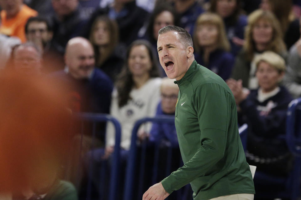 San Francisco head coach Chris Gerlufsen reacts to a foul call during the first half of an NCAA college basketball game against Gonzaga, Thursday, Feb. 9, 2023, in Spokane, Wash. (AP Photo/Young Kwak)