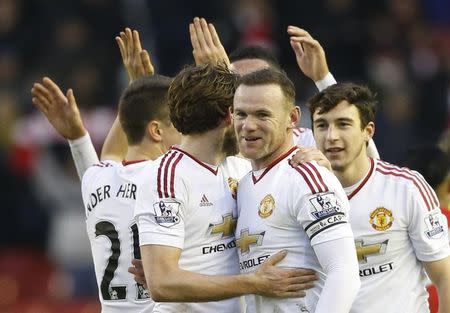 Football Soccer - Liverpool v Manchester United - Barclays Premier League - Anfield - 17/1/16 Manchester United's Wayne Rooney celebrates at full time with teammates Action Images via Reuters / Carl Recine Livepic