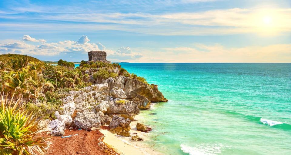 Tulum is characterised by rugged coastal cliffs and inland cenotes (Getty Images/iStockphoto)