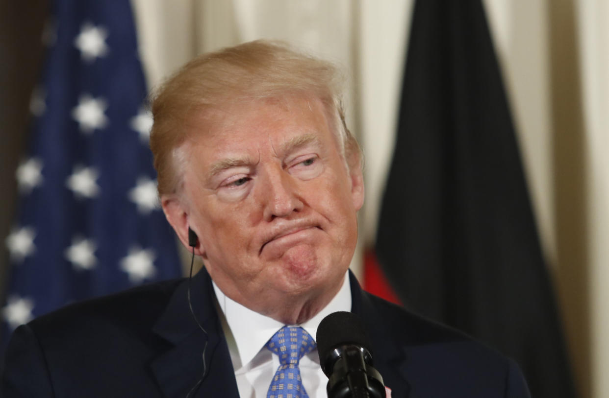 President Donald Trump at a joint news conference with Germany's Chancellor Angela Merkel in the East Room of the White House on&nbsp;Friday. (Photo: Kevin Lamarque / Reuters)