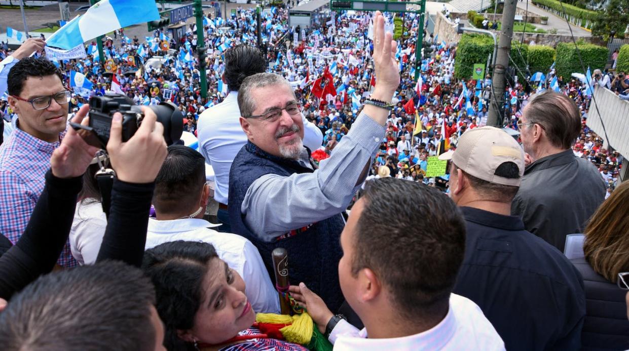 Guatemala's President-elect Bernardo Arévalo waves to supporters. <a href="https://www.gettyimages.com/detail/news-photo/guatemalas-president-elect-bernardo-arevalo-waves-to-news-photo/1735484556" rel="nofollow noopener" target="_blank" data-ylk="slk:Orlando Estrada/AFP via Getty Images;elm:context_link;itc:0;sec:content-canvas" class="link ">Orlando Estrada/AFP via Getty Images</a>