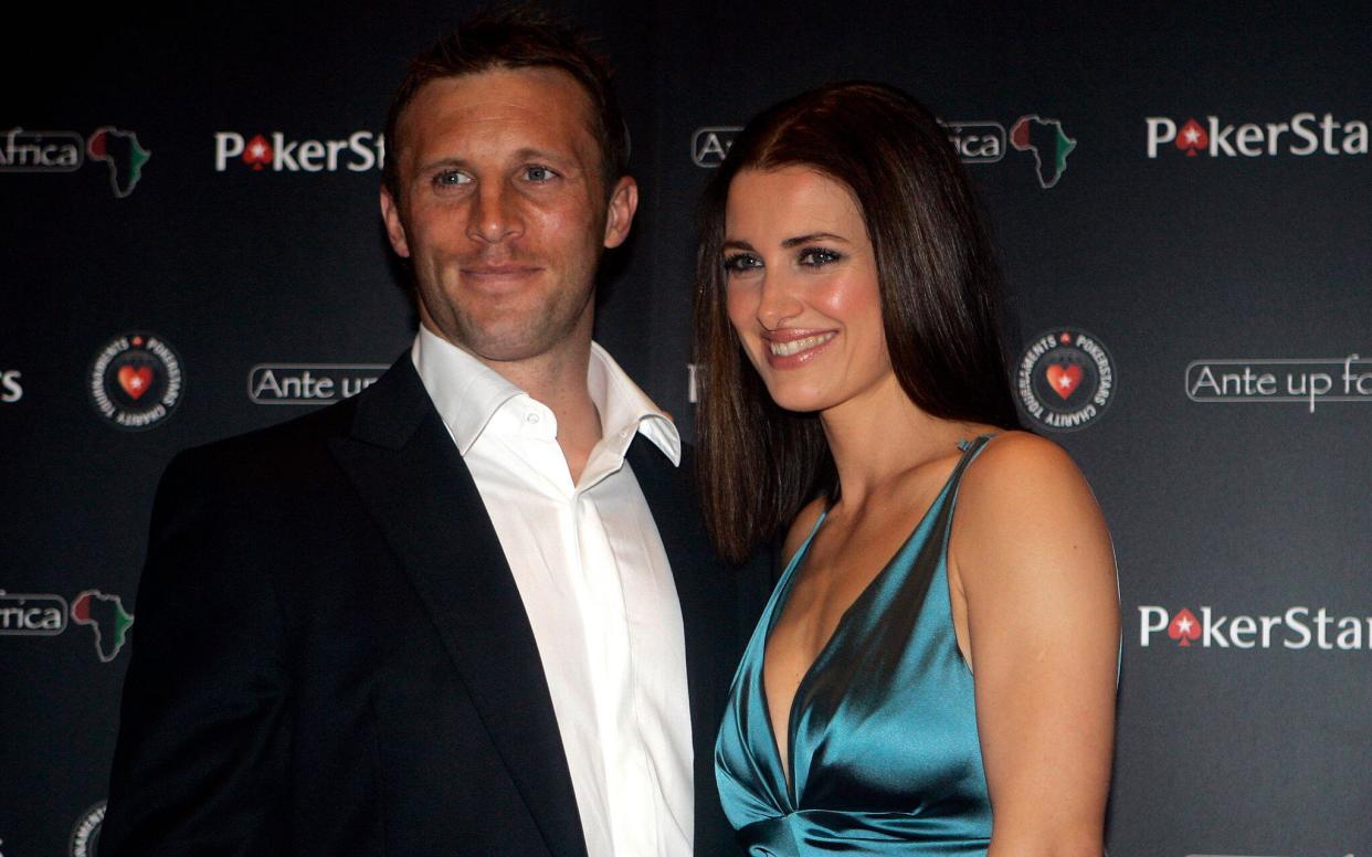 British television presenter Kirsty Gallacher,, right with British rugby player Paul Sampson, seen, before taking part in the 'Ante Up for Africa' European celebrity charity poker tournament, in Monaco, Monday April 27, 2009. (AP Photo/Lionel Cironneau)