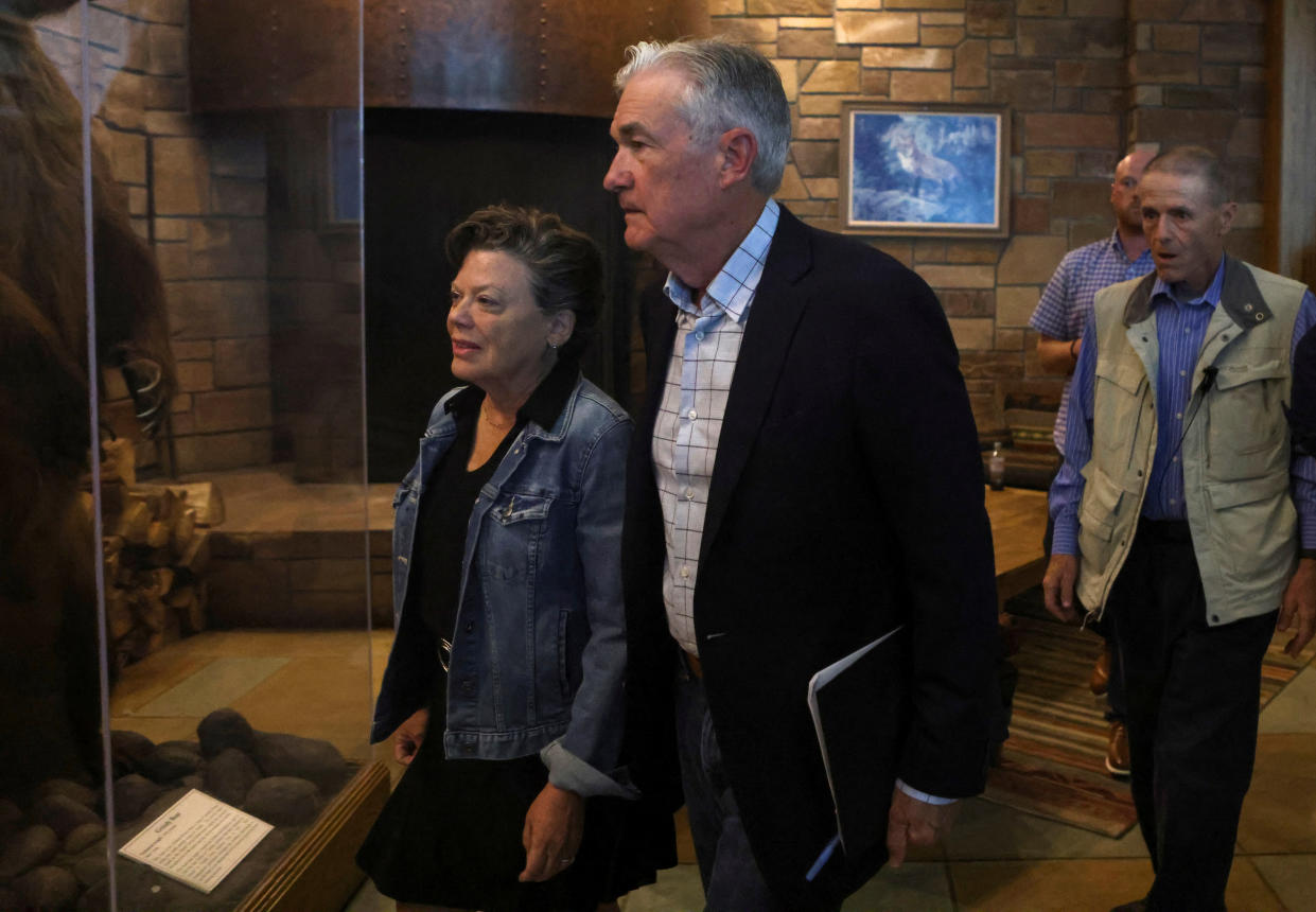 Jerome Powell, chair of the Federal Reserve, and his wife Elissa Leonard attend a dinner program at Grand Teton National Park where financial leaders from around the world are gathering for the Jackson Hole Economic Symposium outside Jackson, Wyoming, U.S., August 25, 2022. REUTERS/Jim Urquhart