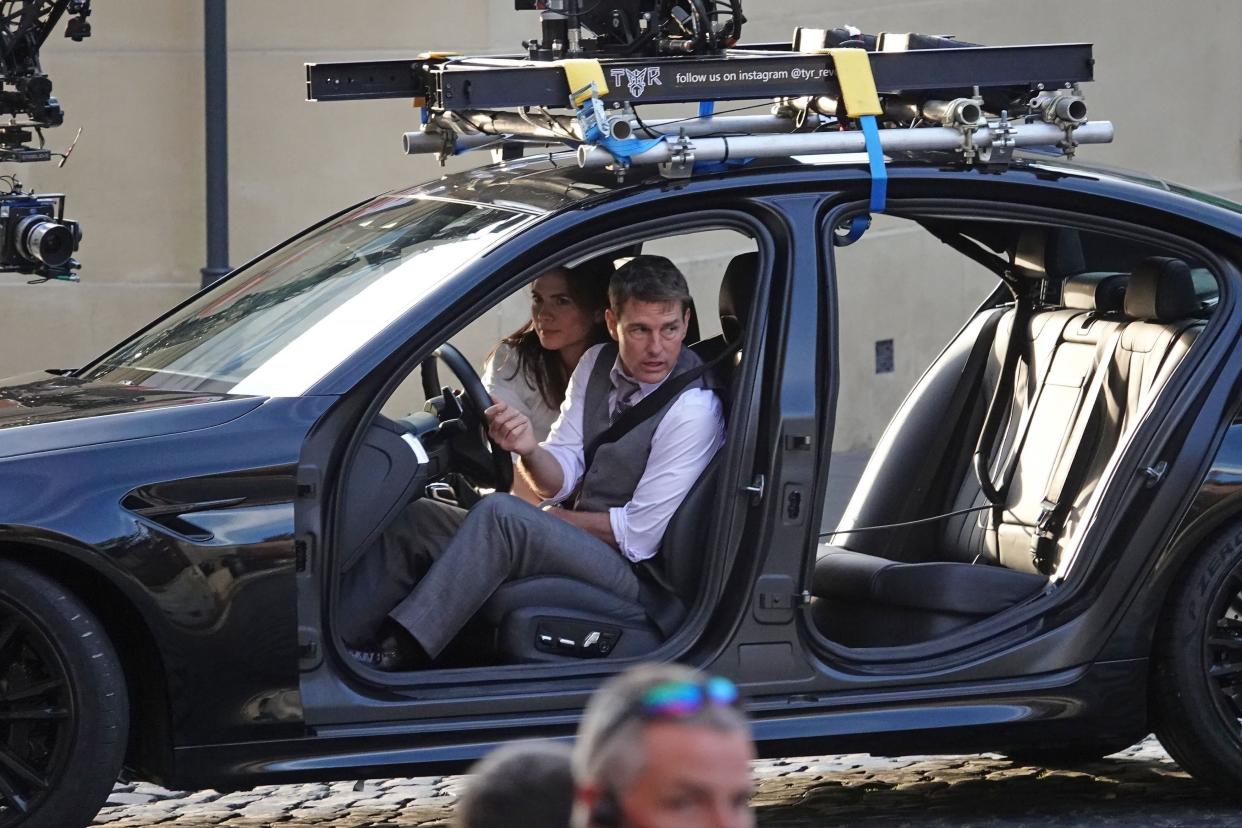 Co-stars Tom Cruise and Hayley Atwell were handcuffed together while filming a dangerous car scene near the Colosseum in Rome, Italy for the upcoming Mission Impossible film.