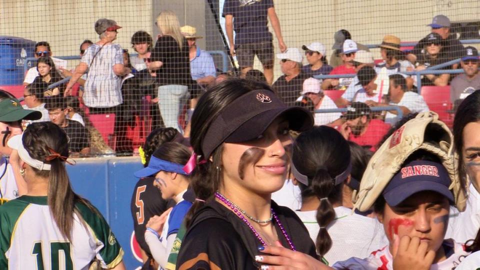 The County’s Marissa Vasquez of Selma smiles before the City/County All-Star high school softball game on Wednesday, June 21, 2023.