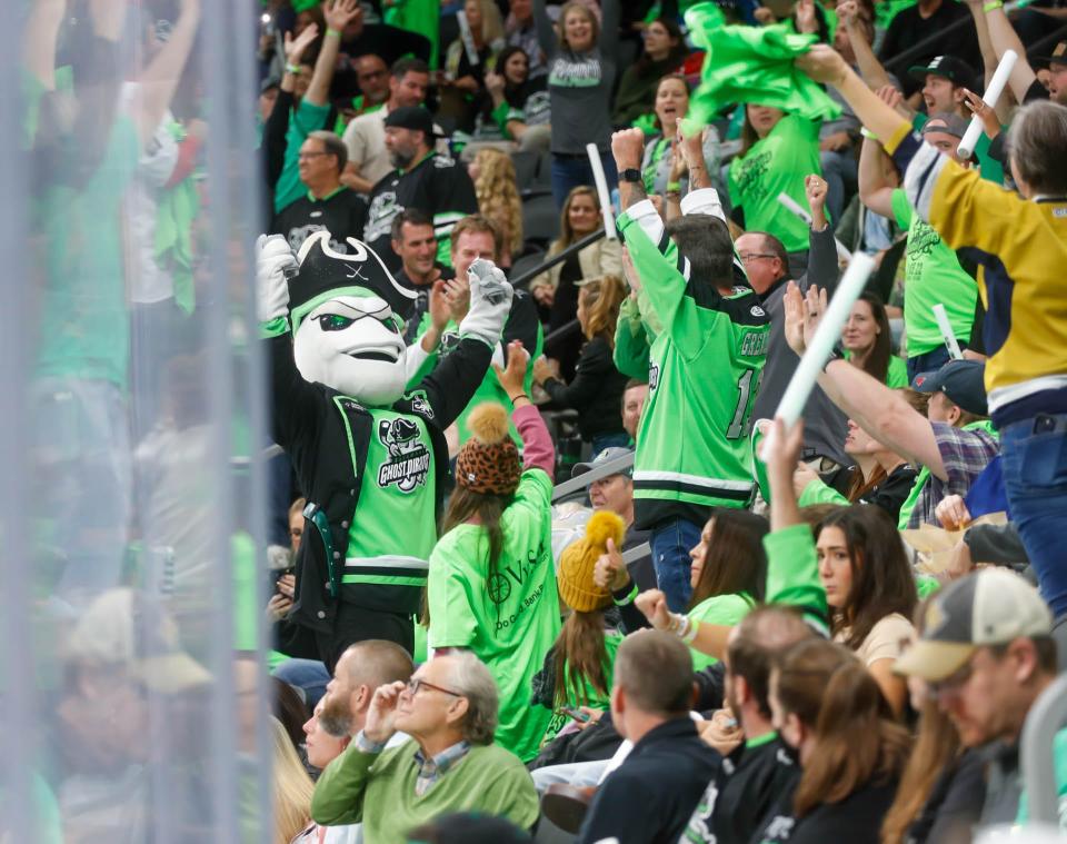 Davy pumps up fans with tee shirts during the Savannah Ghost Pirates season opener on Saturday November 5, 2022.