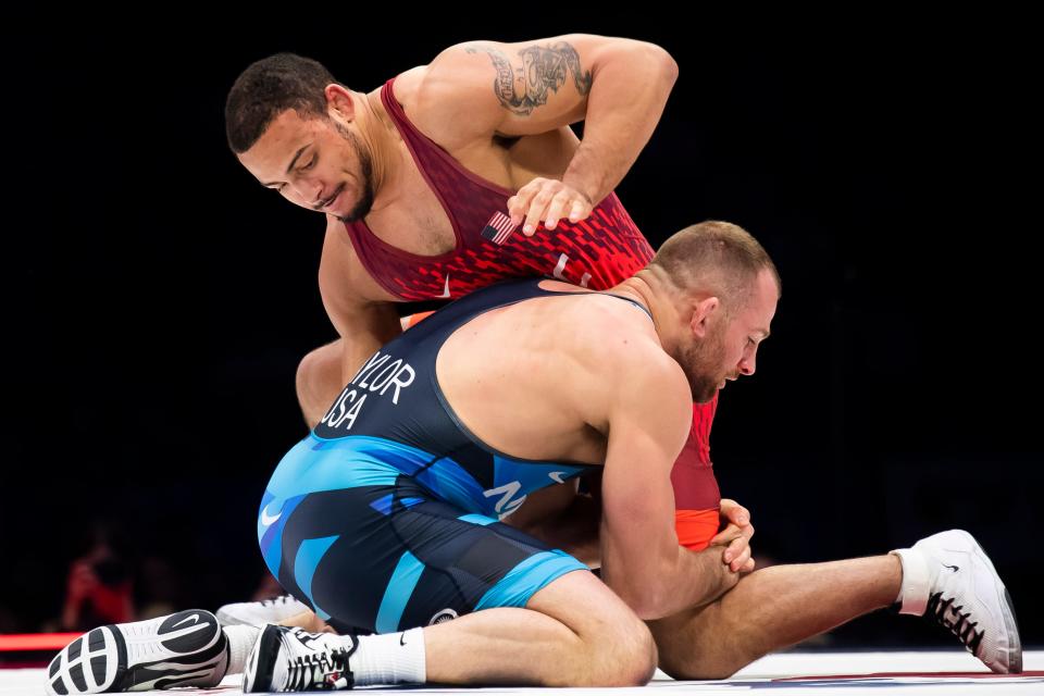 Aaron Brooks (top) wrestles David Taylor in the 86 kilogram best-of-three championship series during the U.S. Olympic Team Trials at the Bryce Jordan Center April 20, 2024, in State College. Brooks won the series, 2-0.