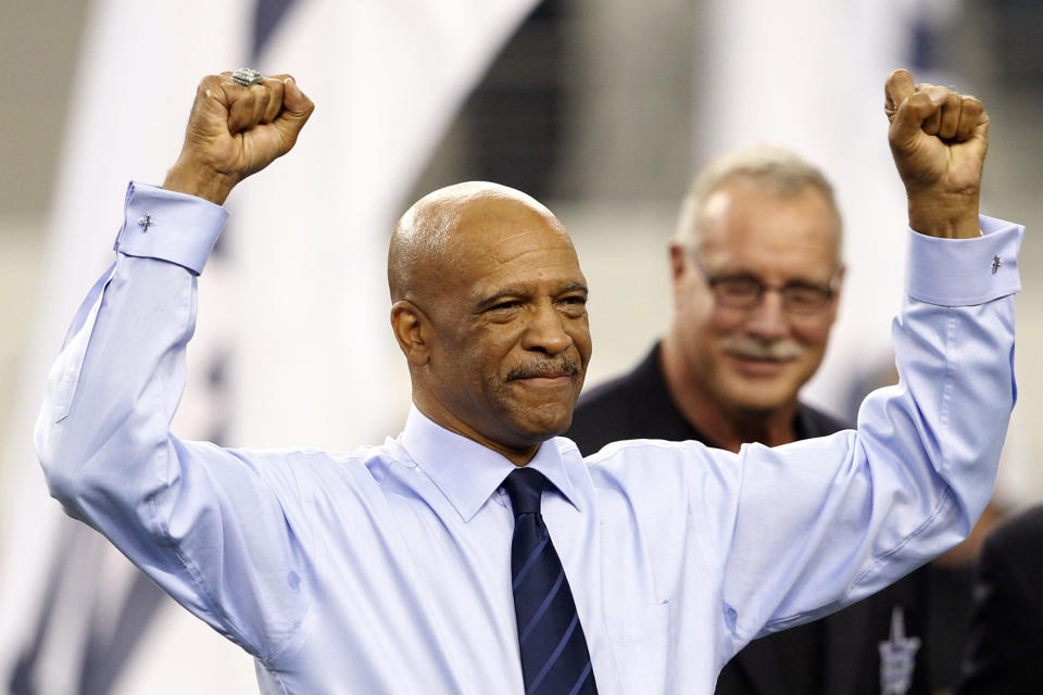 FILE - In this Nov. 6, 2011, file photo, former Dallas Cowboys player Drew Pearson reacts during an induction ceremony into the Cowboys Ring of Honor at halftime of an NFL football game against the Seattle Seahawks  in Arlington, Texas. Former Dallas Cowboys wide receiver Drew Pearson was selected Tuesday, Aug. 18, 2020, as the Senior Finalist for the Pro Football Hall of Fame’s Class of 2021.  (AP Photo/Jim Cowsert)