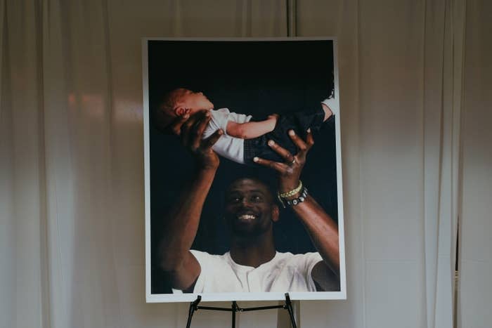 A photograph of Tyre Nichols holding his child sits in the foyer of Mississippi Boulevard Christian Church during his funeral service on Feb. 1 in Memphis.
