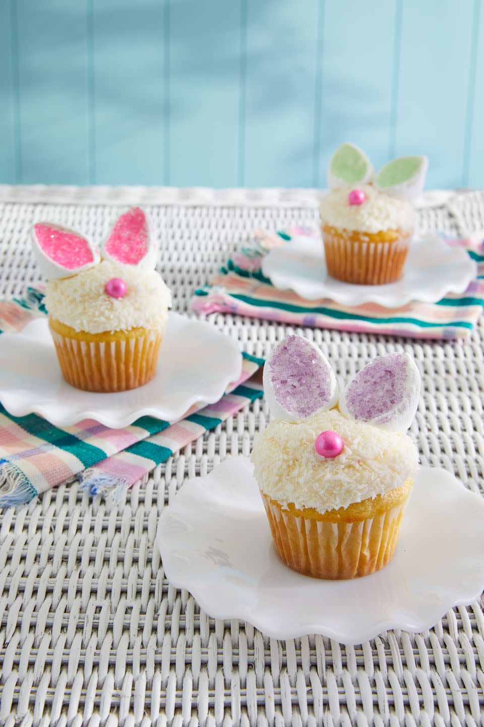 coconut frosted cupcakes with little noses and bunny ears