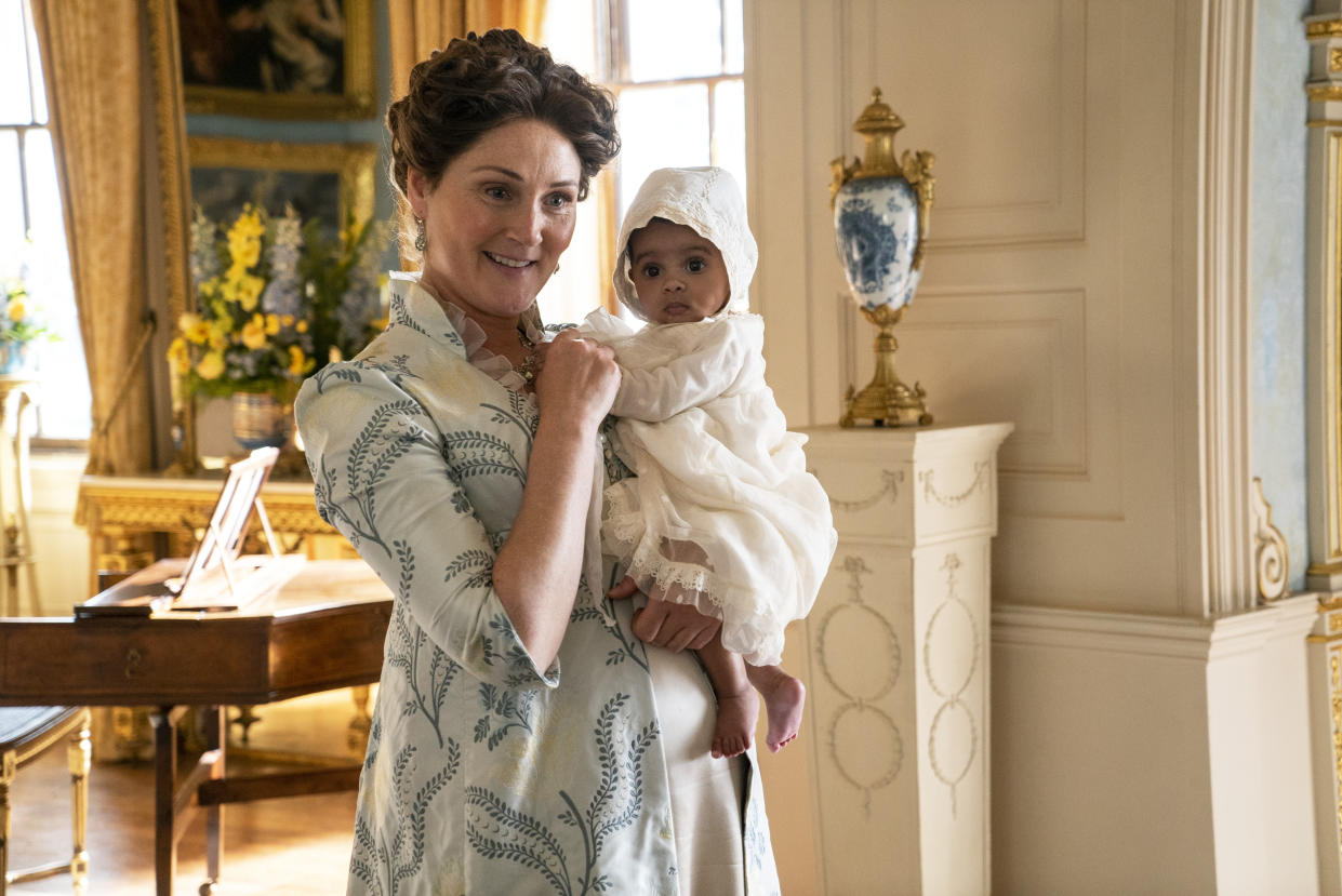 (L to R) Ruth Gemmell as Lady Violet Bridgerton, Arianna and Ava Gittens-Roberts as Baby Augie in <i>Bridgerton</i><span class="copyright">Liam Daniel—Netflix</span>