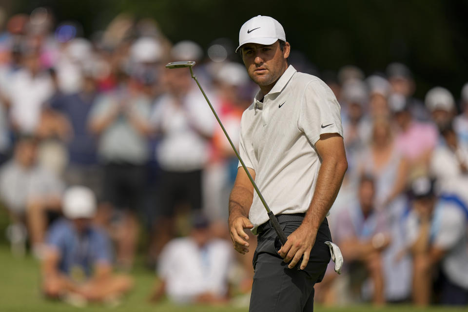 Scottie Scheffler watches his putt on the 15th hole during the second round of the PGA Championship golf tournament at Southern Hills Country Club, Friday, May 20, 2022, in Tulsa, Okla. (AP Photo/Eric Gay)