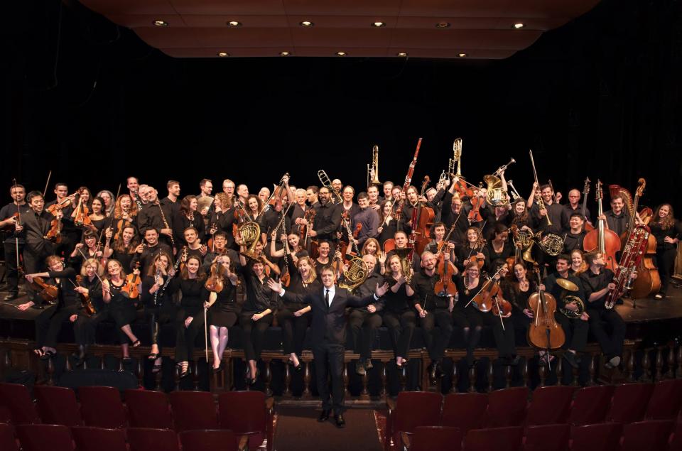 The New Bedford Symphony Orchestra (NBSO) with Maestro Yaniv Dinur, front.