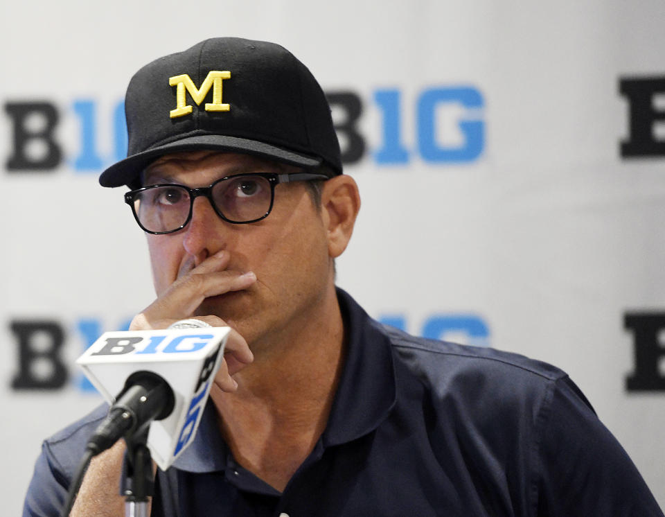 Would Michigan head coach Jim Harbaugh consider another stint in the NFL? (AP)