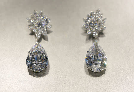 The Miroir de l'Amour, a pair of flawless diamond pear-shaped earrings, during a sale preview at Christie's auction house in London, Britain October 20, 2016. REUTERS/Neil Hall/File Photo