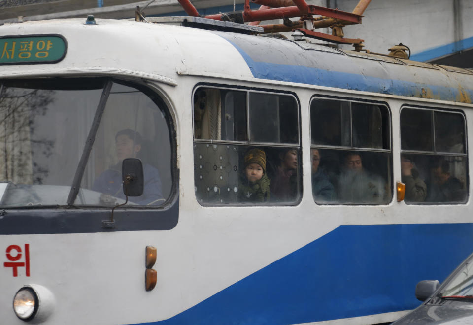 In this Sunday, Feb. 3, 2019 photo, people ride on a tram in Pyongyang, North Korea. Pyongyang is upgrading its overcrowded mass transit system with brand new subway cars, trams and buses in a campaign meant to show leader Kim Jong Un is raising the country's standard of living. (AP Photo/Dita Alangkara)