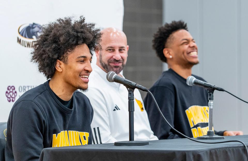 Expectations are sky high this season for coach Bart Lundy, BJ Freeman (right) and the UWM Panthers.