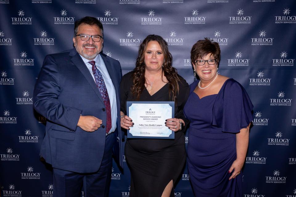 Left to right are, Trilogy Divisional Vice President Rey Nevarez, Director of Health Services Tammy Whitaker, and Executive Director Nanci Kosanka.