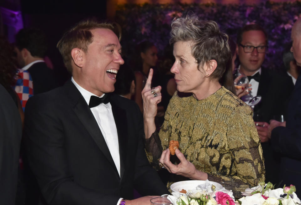 Frances McDormand chats with talent agent Kevin Huvane at the Vanity Fair Oscar Party. (Photo: Kevin Mazur/VF18 via Getty Images)