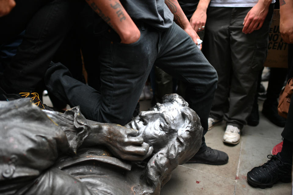 Protesters pull down a statue of Edward Colston during a Black Lives Matter protest rally in College Green, Bristol, in memory of George Floyd who was killed on May 25 while in police custody in the US city of Minneapolis.