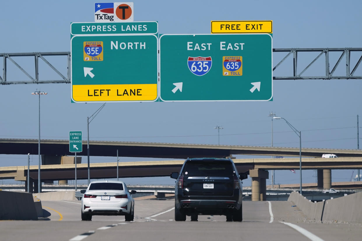 Drivers make their way on an express tollway in Dallas, Friday, March 3, 2023. There is growing interest in the South in fee-based express lanes in which some drivers can up to avoid congestion on highways where other drivers can access general lanes for free. (AP Photo/LM Otero)