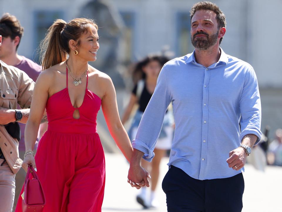 Jennifer Lopez and Ben Affleck strolling near the Louvre Museum in Paris, France.