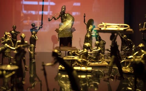 Benin has demanded restitution of national treasures taken from the former French colony Dahomey and now on display in a French museum - Credit: GERARD JULIEN /AFP