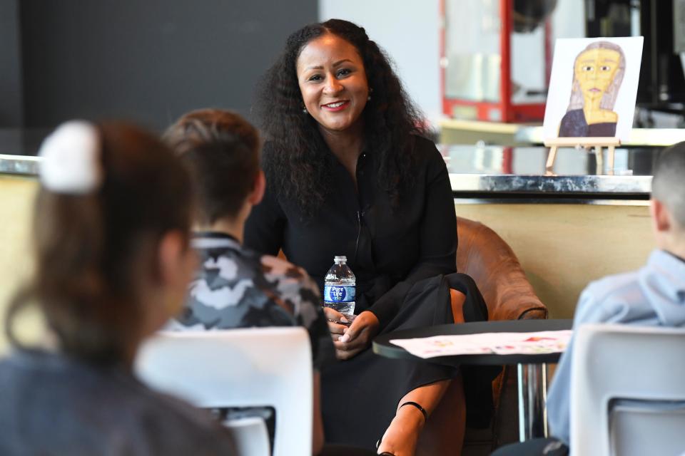 Entrepreneur Angela Benton speaks with kids at the Middlebrook Boys & Girls Club in West Knoxville on Feb. 28.