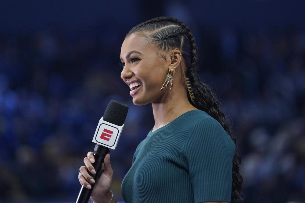 Malika Andrews speaks during an NBA basketball game between the Golden State Warriors and the Phoenix Suns in San Francisco, Friday, Dec. 3, 2021. (AP Photo/Jeff Chiu, File)