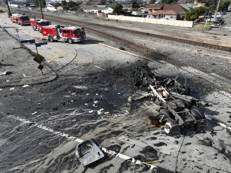 Wilmington, CA - February 15: Aerial view of truck explosion, with firefighting equipment visible in the debris, where several firefighters were injured, at least two critically, in an explosion involving a truck with pressurized cylinders in Wilmington Thursday, Feb. 15, 2024. Firefighters were sent to the 1100 block of North Alameda Street shortly before 7 a.m., according to Nicholas Prange of the Los Angeles Fire Department. ``Several other injured are being evaluated on scene, awaiting additional ambulances to arrive -- (an) estimated seven total firefighters,'' Prange said.(Allen J. Schaben / Los Angeles Times)