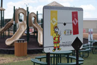 This Thursday, Aug. 9, 2018, photo, provided by U.S. Immigration and Customs Enforcement, shows a playground area at the South Texas Family Residential Center in Dilley, Texas. Currently housing 1,520 mothers and their children, about 10 percent are families who were temporarily separated and then reunited under a “zero tolerance policy” that has since been reversed. (Charles Reed/U.S. Immigration and Customs Enforcement via AP)