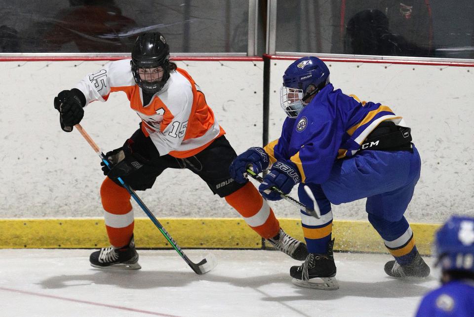 Churchville-Chilis Gavin Carr tries to avoid irondequoits Douglas Velepec. 