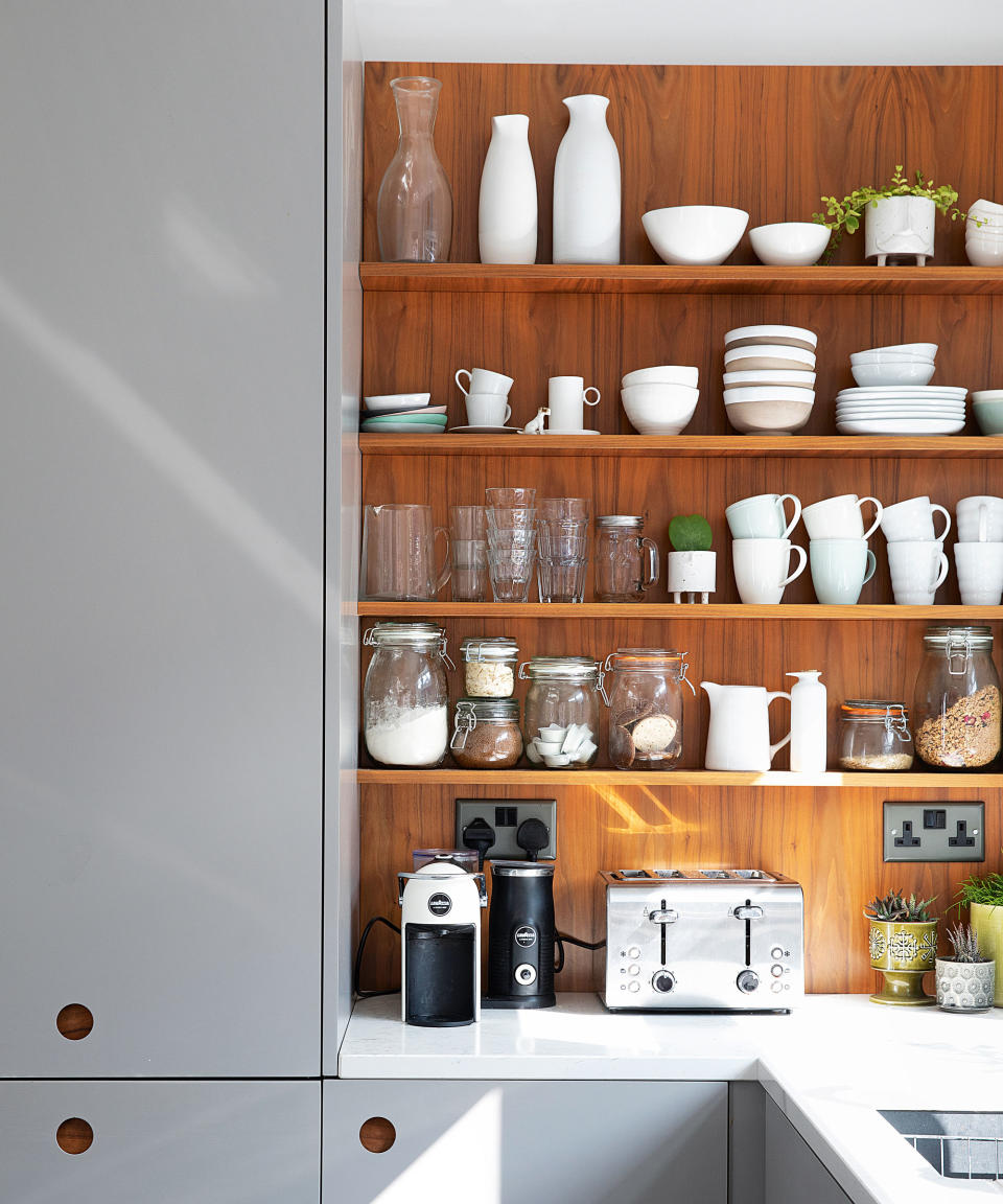 <p> 'Instead of installing closed cabinetry which requires more material and more time to build, using open-shelving for upper cabinets can not only save on material and labor costs, but also offers a great opportunity to display beautiful dishes and glassware that are often hidden,' says Gunawan.  </p> <p> In this Scandi-esque kitchen addition, choosing bespoke a kitchen shelving removed the need for additional wall cupboards and helped keep the space light and airy. It's also created the perfect space for a small coffee bar – making your morning brew a little easier.  </p>