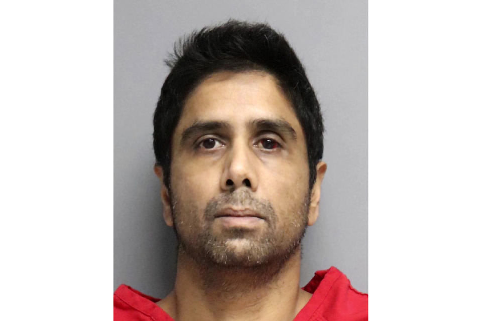 FILE - This undated photo provided by the San Mateo County Sheriff's Office shows Dharmesh Patel. The wife of Patel, a California radiologist accused of trying to kill his family when he drove his Tesla off a cliff along the Northern California coast told rescuers her husband was depressed and needed a psychological evaluation, according to a newly unsealed search warrant affidavit. (San Mateo County Sheriff's Office via AP, File)