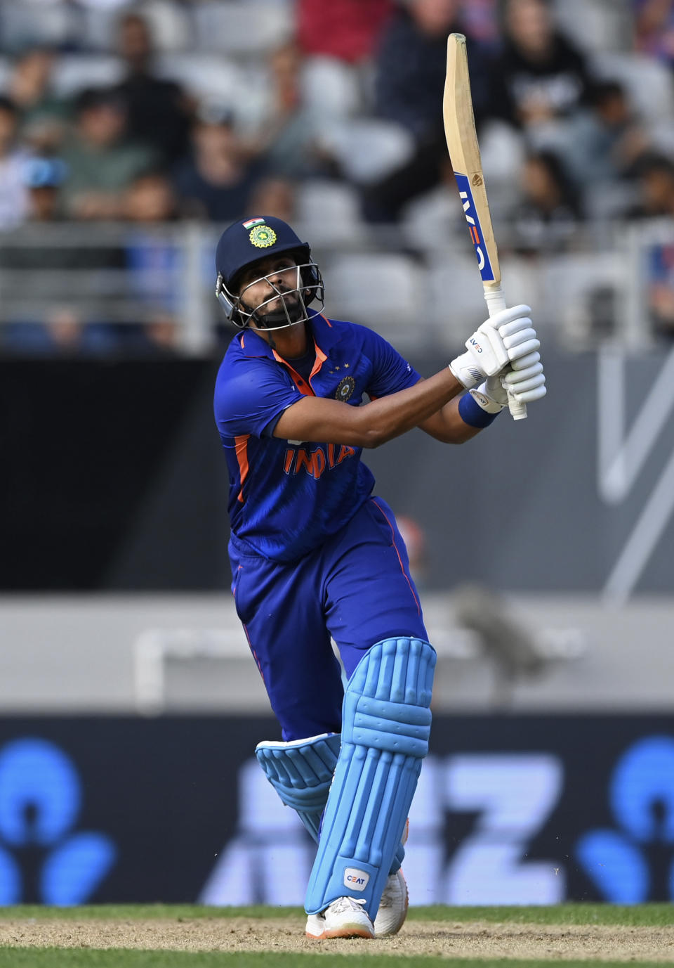 India's Shreyas Iyer hits a 6 against New Zealand during their one day international cricket match in Auckland, New Zealand, Friday, Nov. 25, 2022. (Andrew Cornaga/Photosport via AP)