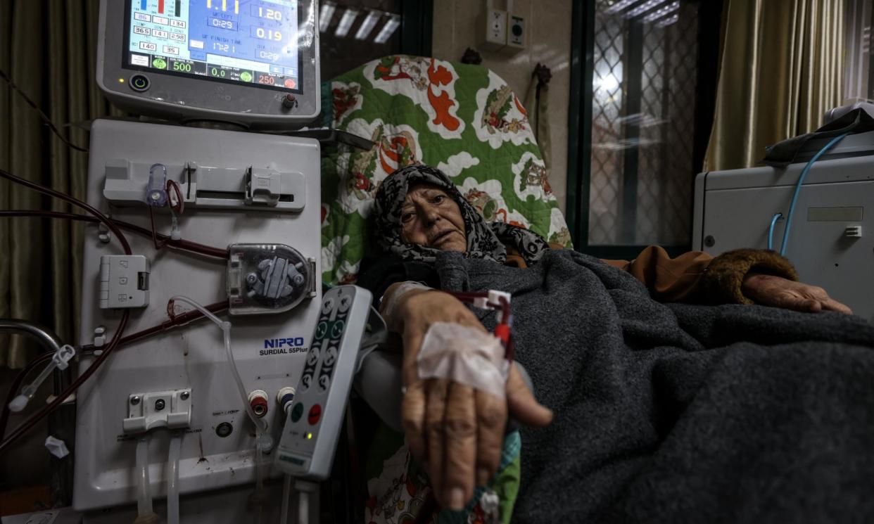 <span>A Palestinian woman receives dialysis treatment at the Al-Aqsa Martyrs Hospital on February 8, 2024.</span><span>Photograph: Anadolu/Getty Images</span>